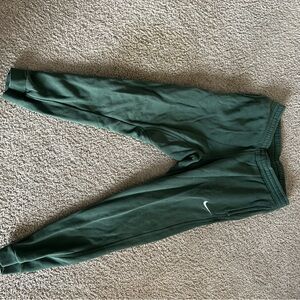 AL green nike sweatpants.